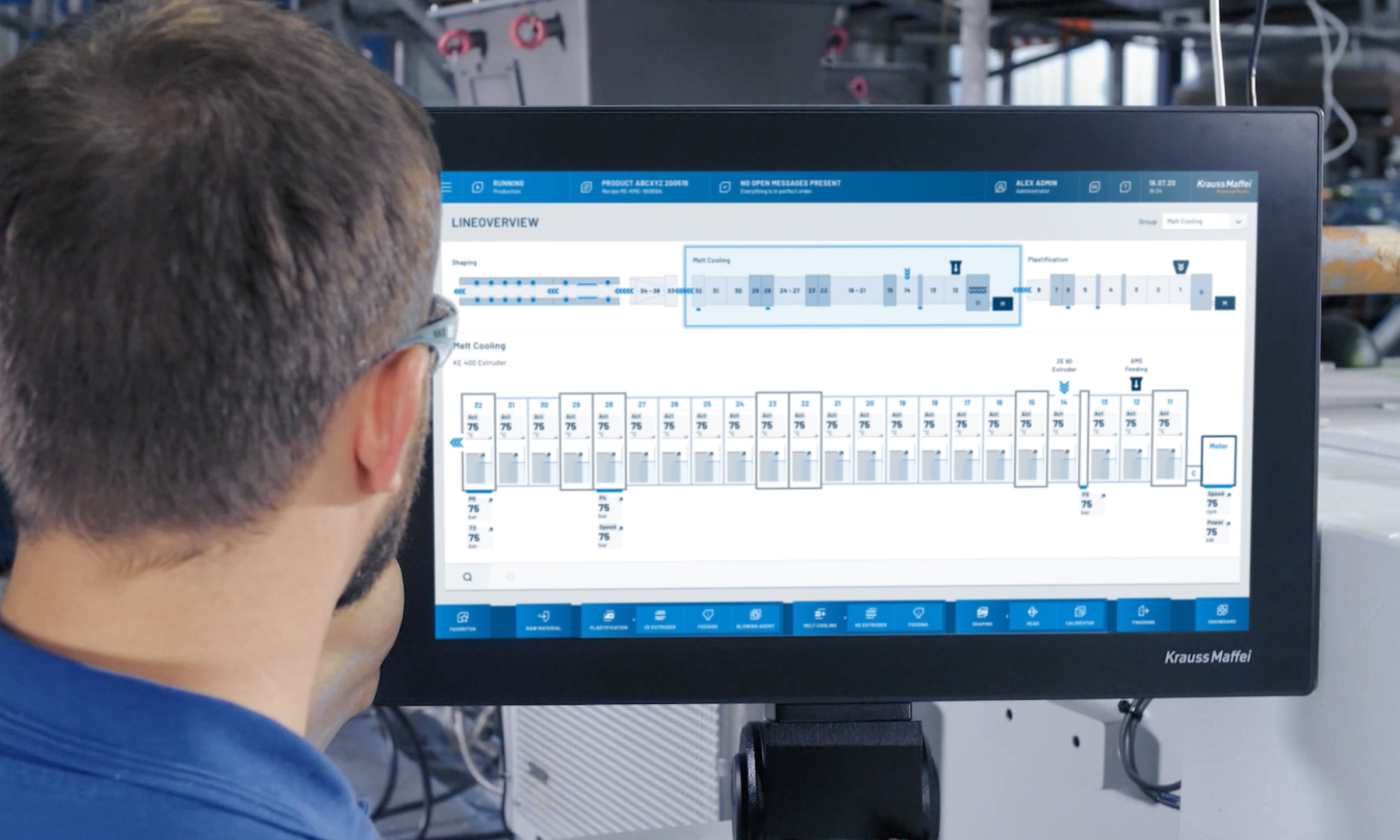 HMI Project KraussMaffei GmbH pioneerProcessControl employee checks the lines overview